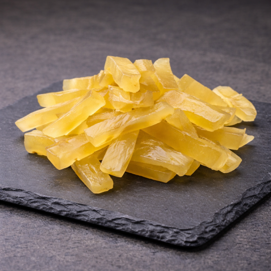 Candied ginger in stick-shaped pieces for pastry and confectionery use