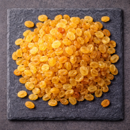 Golden raisins presented in a contemporary professional kitchen