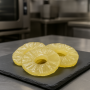 Candied pineapple slices on premium slate board – Provence specialty