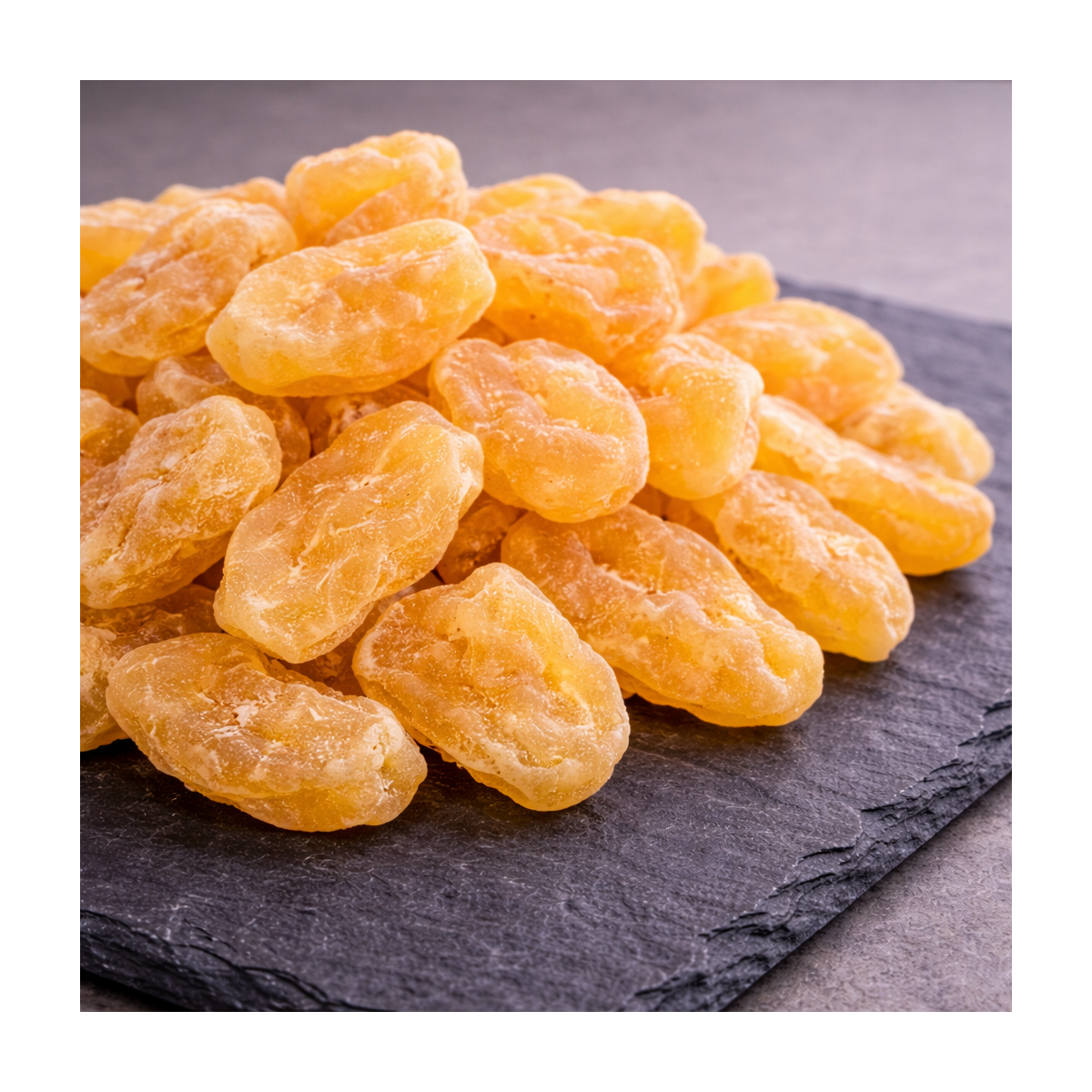 Dehydrated apple on premium slate board – soft and tender fruit