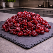 Dried cranberries on slate in a modern professional kitchen, e-commerce visual
