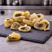 Dehydrated passion fruit with soft texture on premium slate